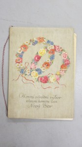 An A4 size book delicately decorated with two wreaths of flowers overlapping each other.