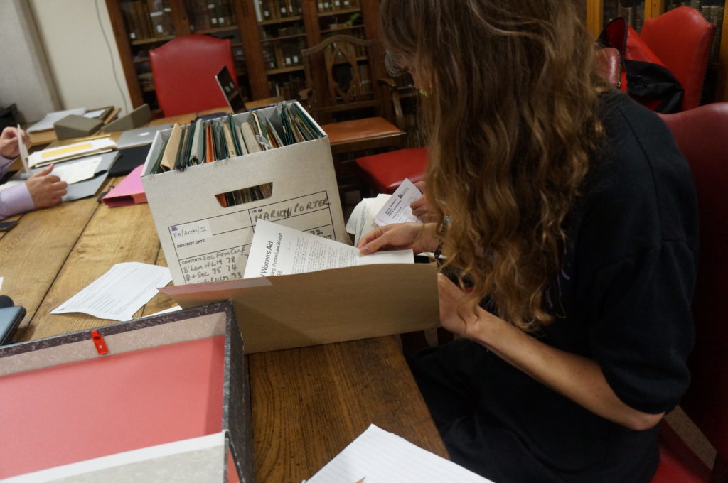 A researcher reads in the Feminist Archive South